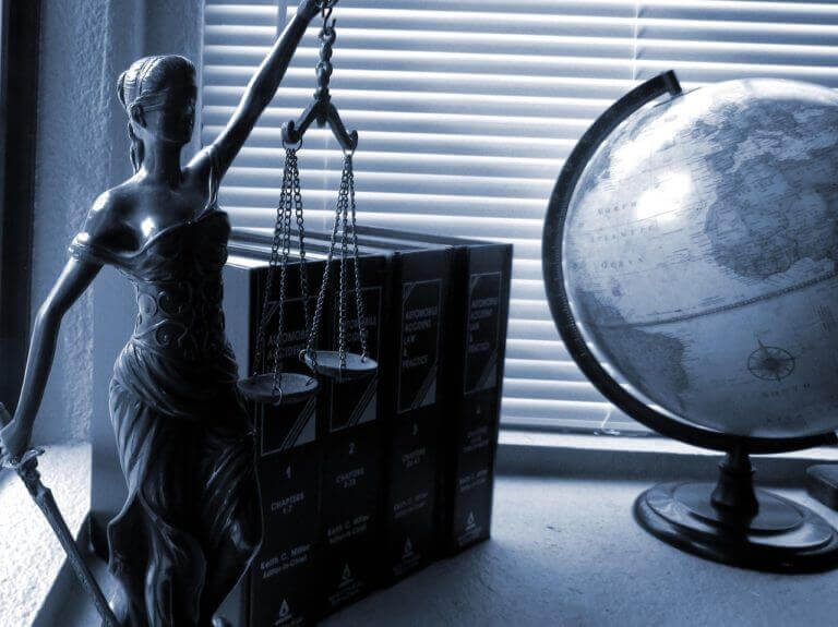 lady justice statue on desk