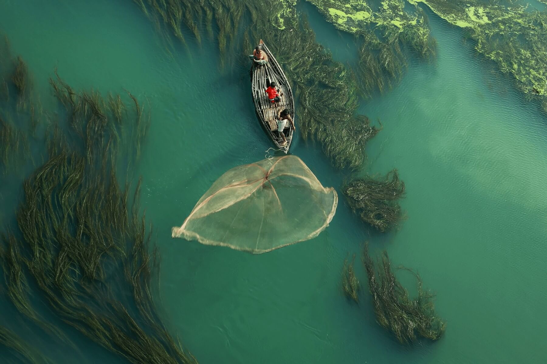 aerial view of small boat on water