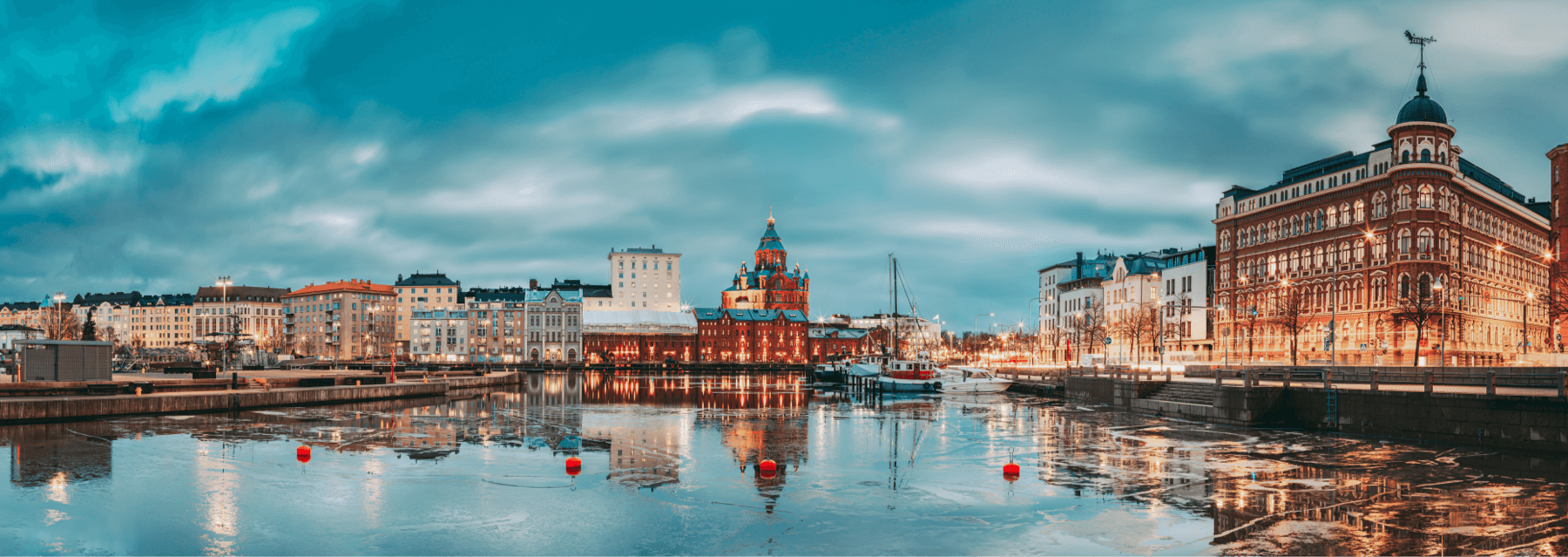 Finnish city lit up at dusk