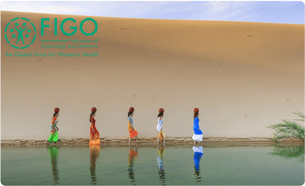 FIGO logo with sand dunes behind